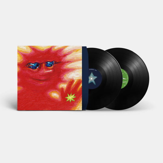 Vinyl record set with colorful cover art.