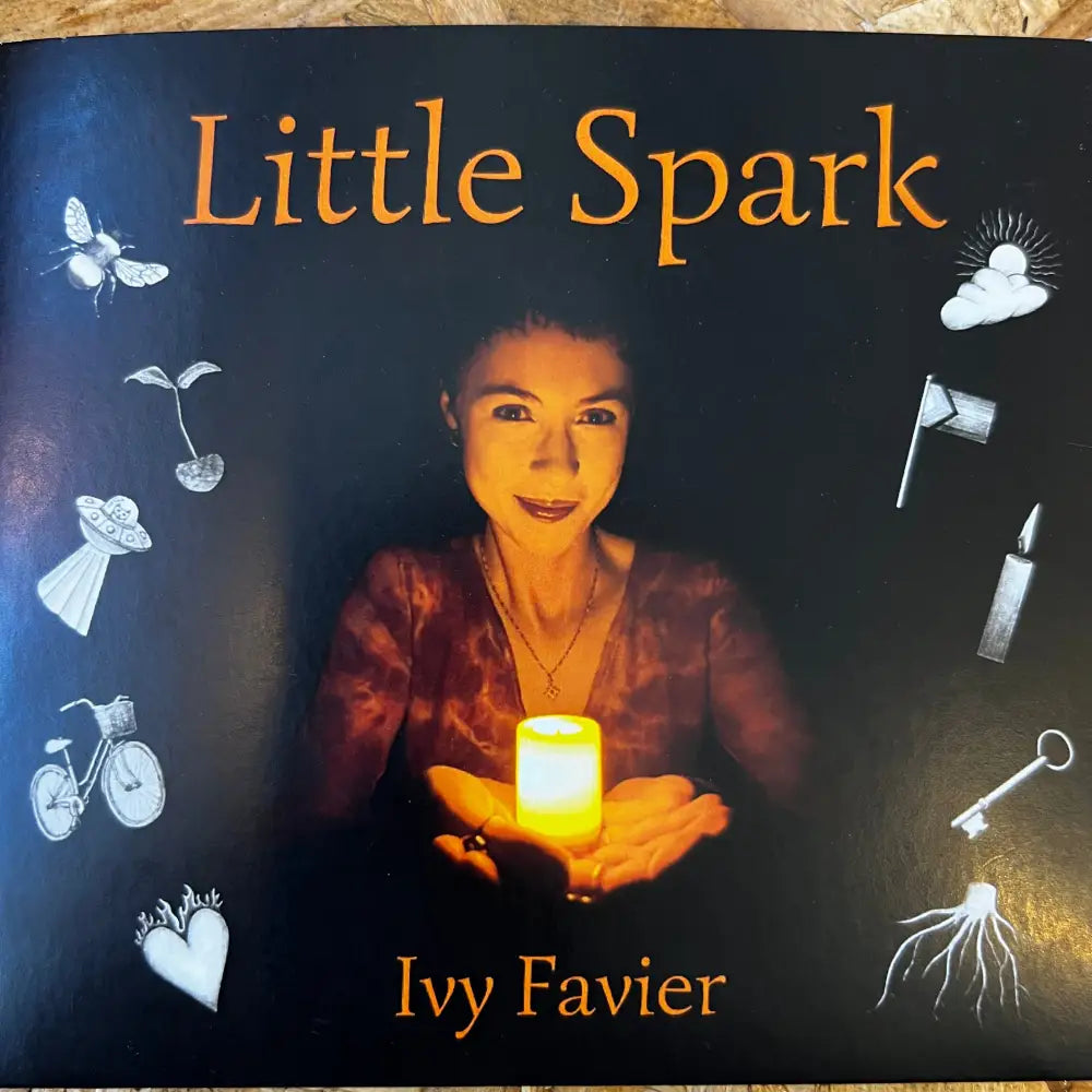Book cover with a woman holding a candle.
