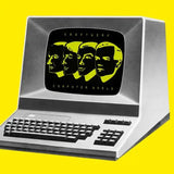 Vintage computer with album art.