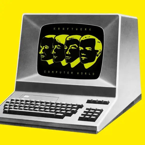 Vintage computer with album art.