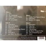 Black vinyl record album sleeve with white text listing track titles for side a through d.