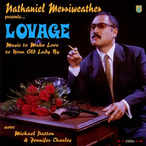 Album cover featuring a suited man with a mustache, roses, and a gun.