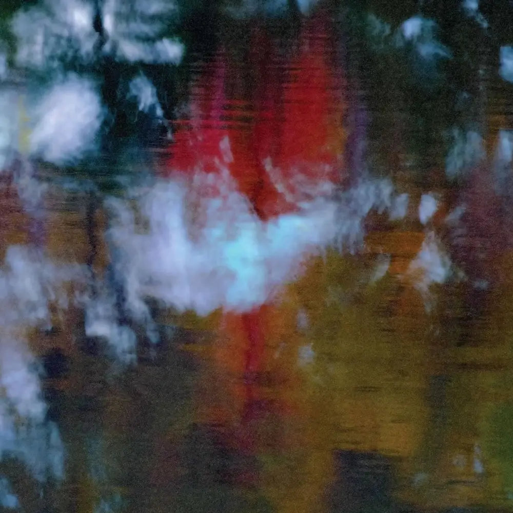 Abstract expressionist painting with vibrant colors.