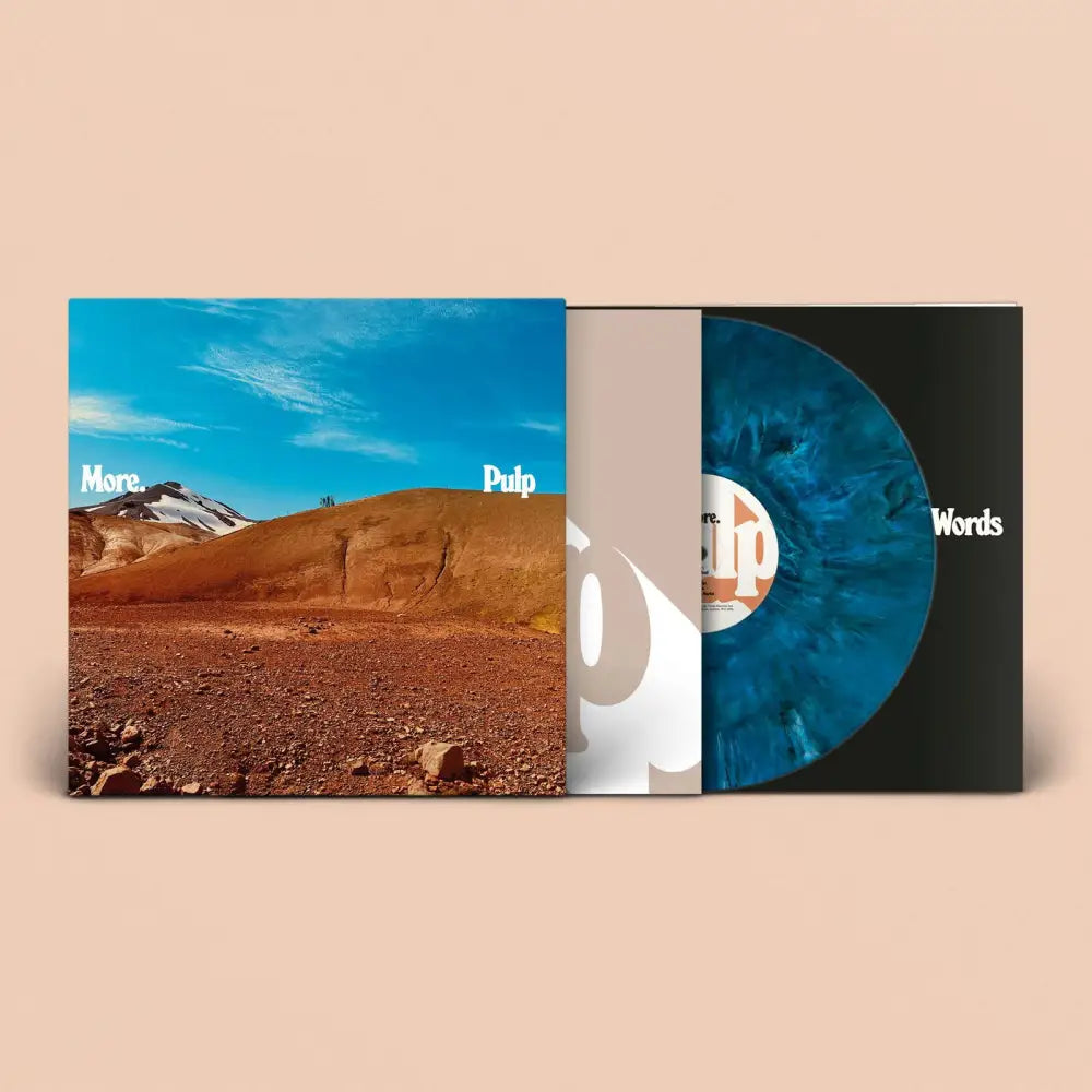 A vinyl record set with a blue marbled disc and a cover featuring a desert landscape.