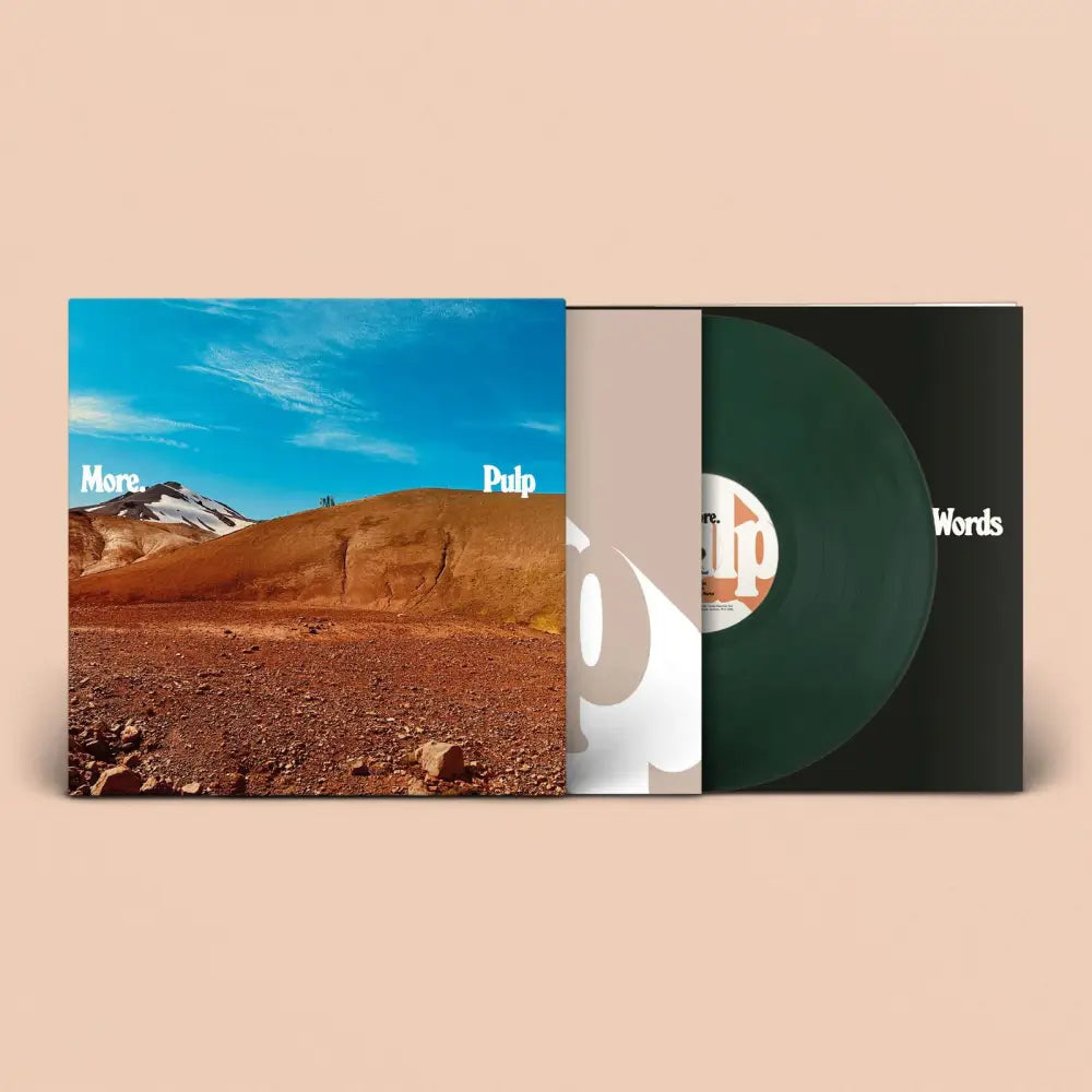 An open vinyl record set featuring a landscape album cover and a green disc.